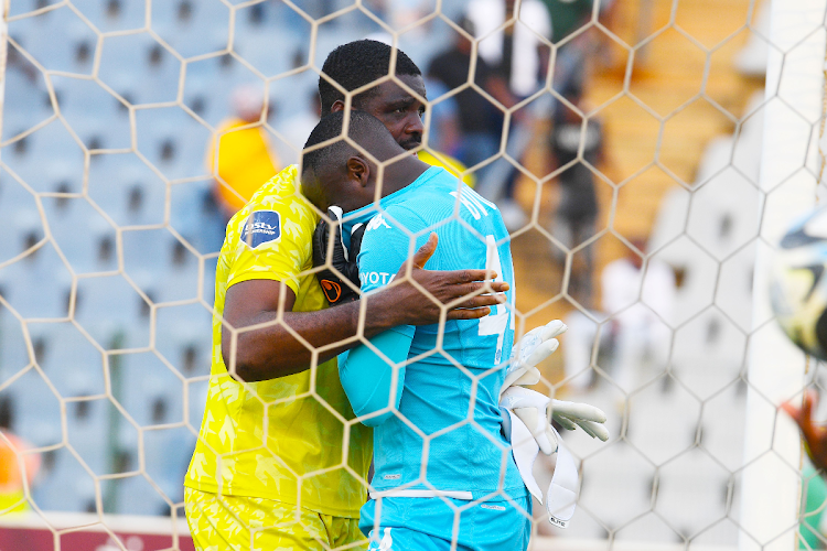 Moroka Swallows goalkeeper Daniel Akpeyi comforts emotional Kaizer Chiefs counterpart Bruce Bvuma after the DStv Premiership match at Dobsonville Stadium on November 26 2023.