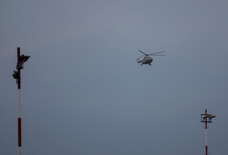 A helicopter carrying the bodies of the victims of the Tara Air passenger plane, that crashed with 22 people on board while on its way to Jomsom, arrives at the airport in Kathmandu, Nepal on May 30, 2022.