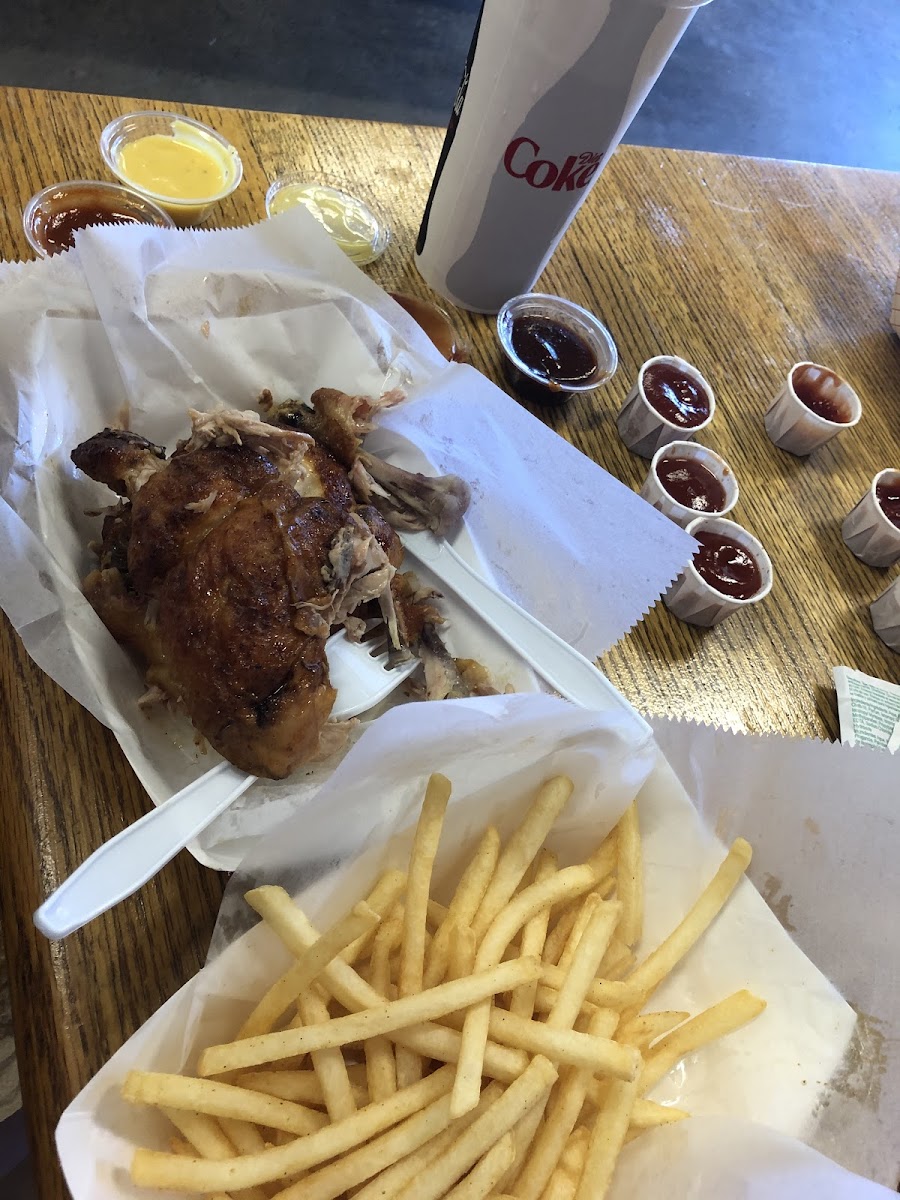 1/2 Chicken with fries! So good!!! Spicy BBQ sauce and Honey Mustard sauce! Yummm