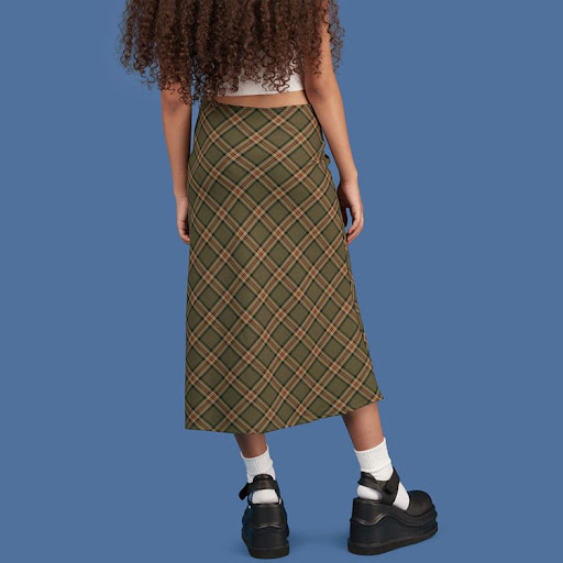 Title 2, Elegant fishtail hem skirt designed to flatter ...