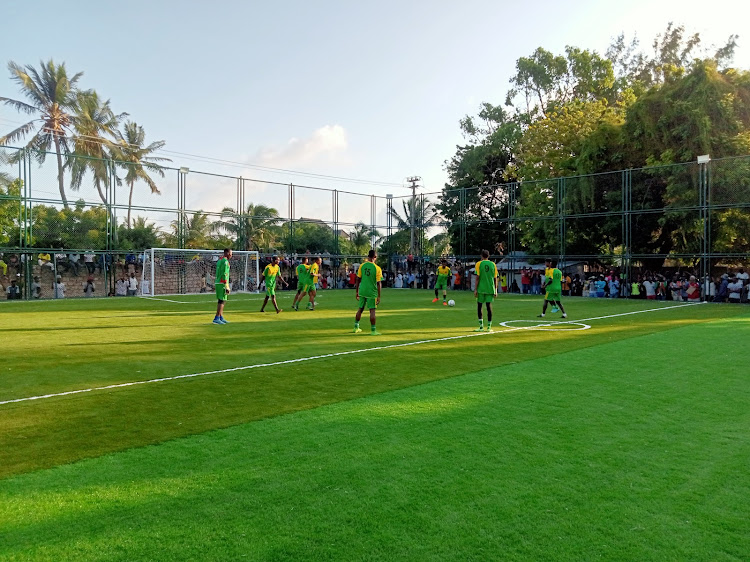 A soccer match at the new Astro-Turf pitch at the Mkomani