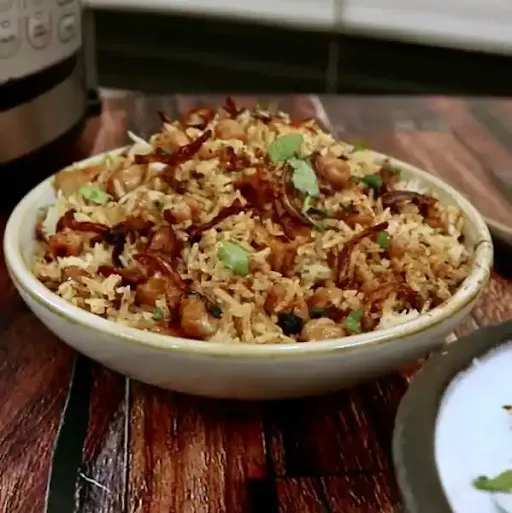 Handi Amritsari Choley Biryani