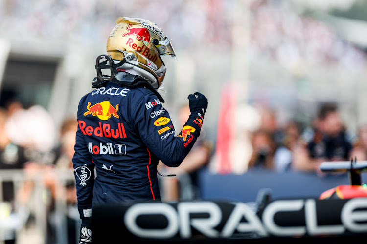 Max Verstappen celebrates pole position during qualifying ahead of the F1 Grand Prix of Mexico at Autodromo Hermanos Rodriguez on October 29, 2022 in Mexico City, Mexico.