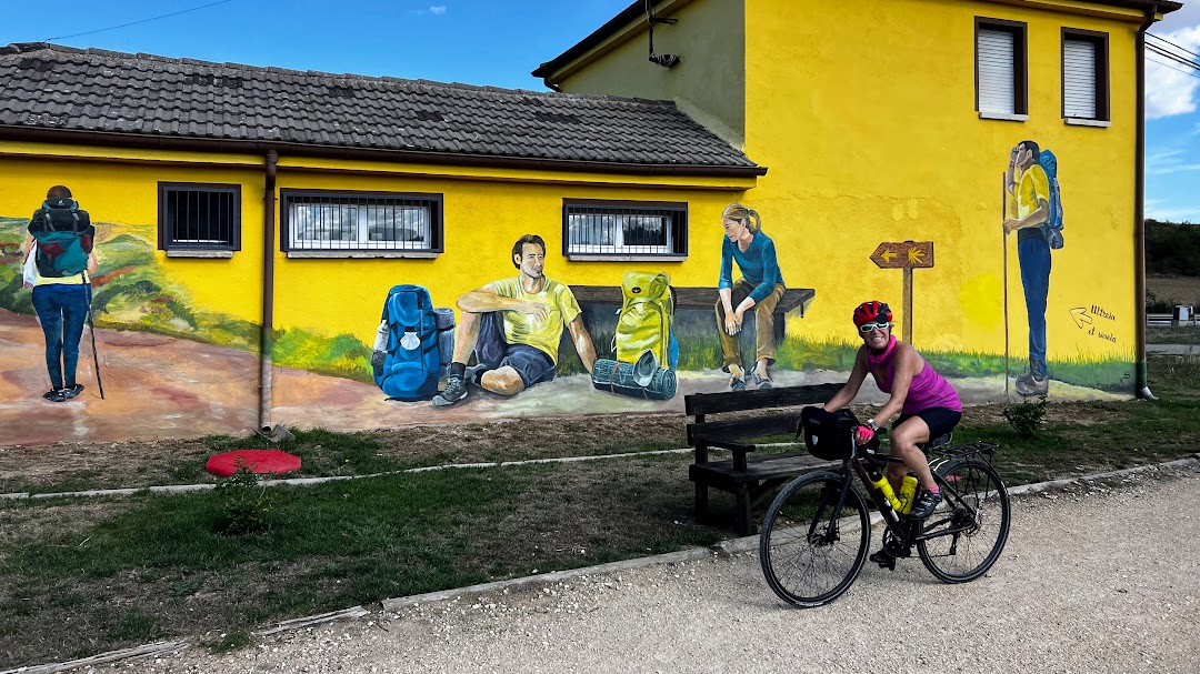 Female cyclist bike touring the Camino de Santiago in Spain