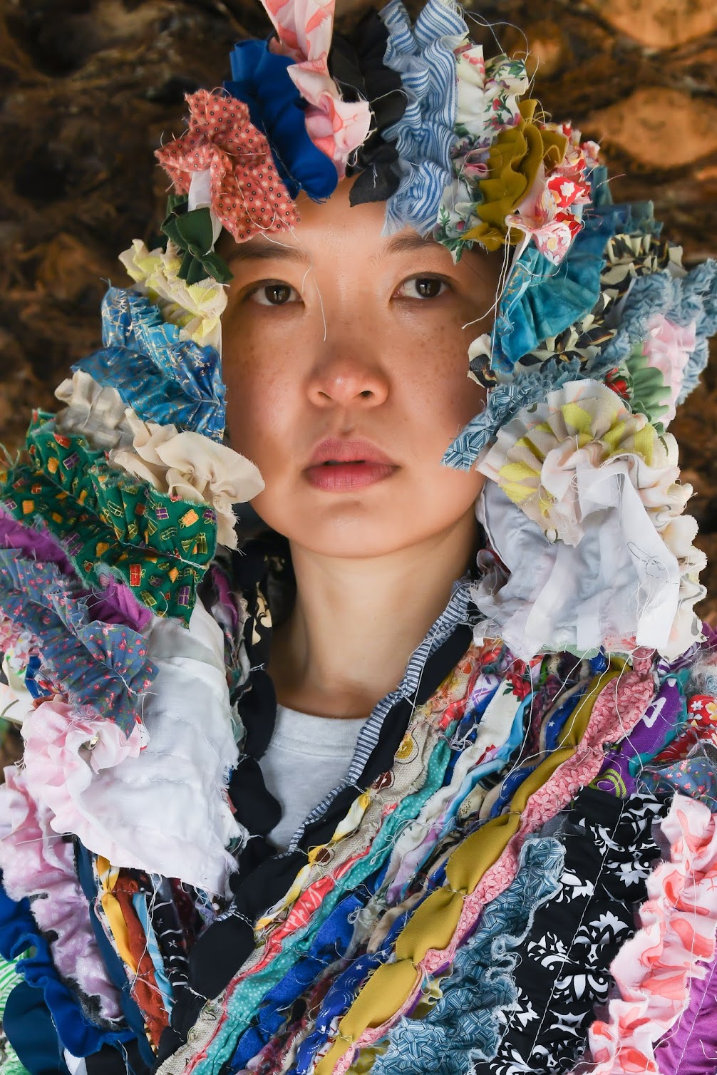 Close-up of Mira Musank wrapped in 6th iteration of Gathered Cloths. Photo by Cynthia Anderson. | Fafafoom Studio