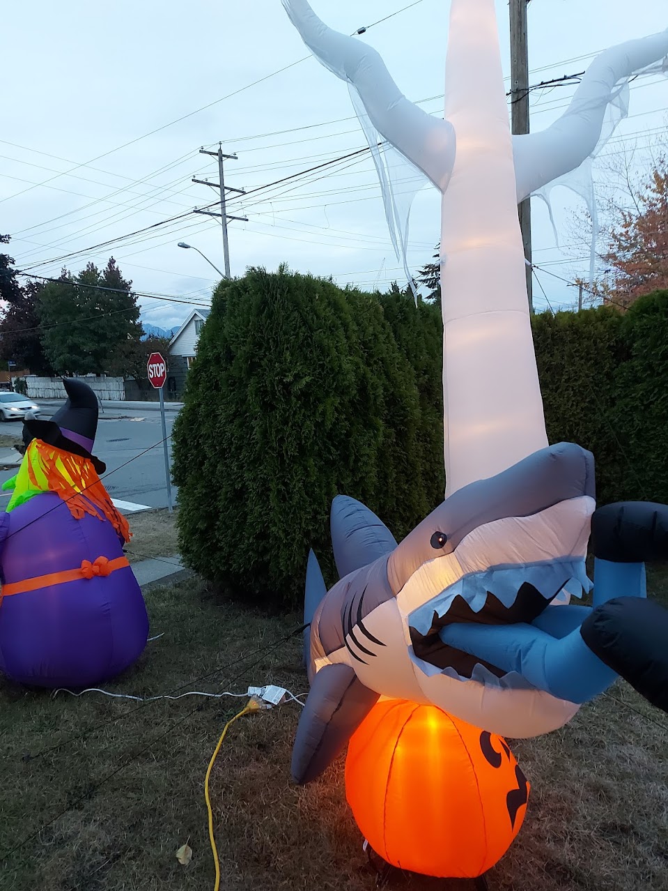 inflatable 10' ghost and shark with legs in mouth