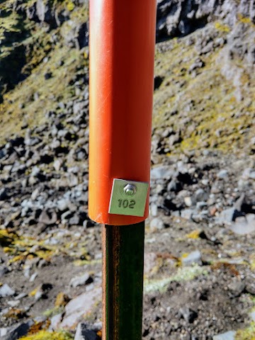 numbered snow pole marker