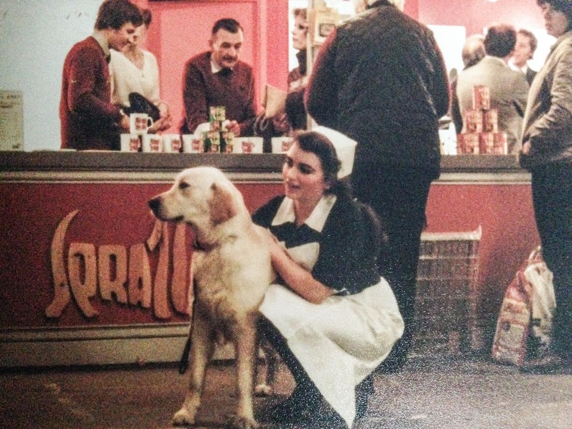 An old photograph taken in 1984 of a veterinary nurse with a dog at Crufts