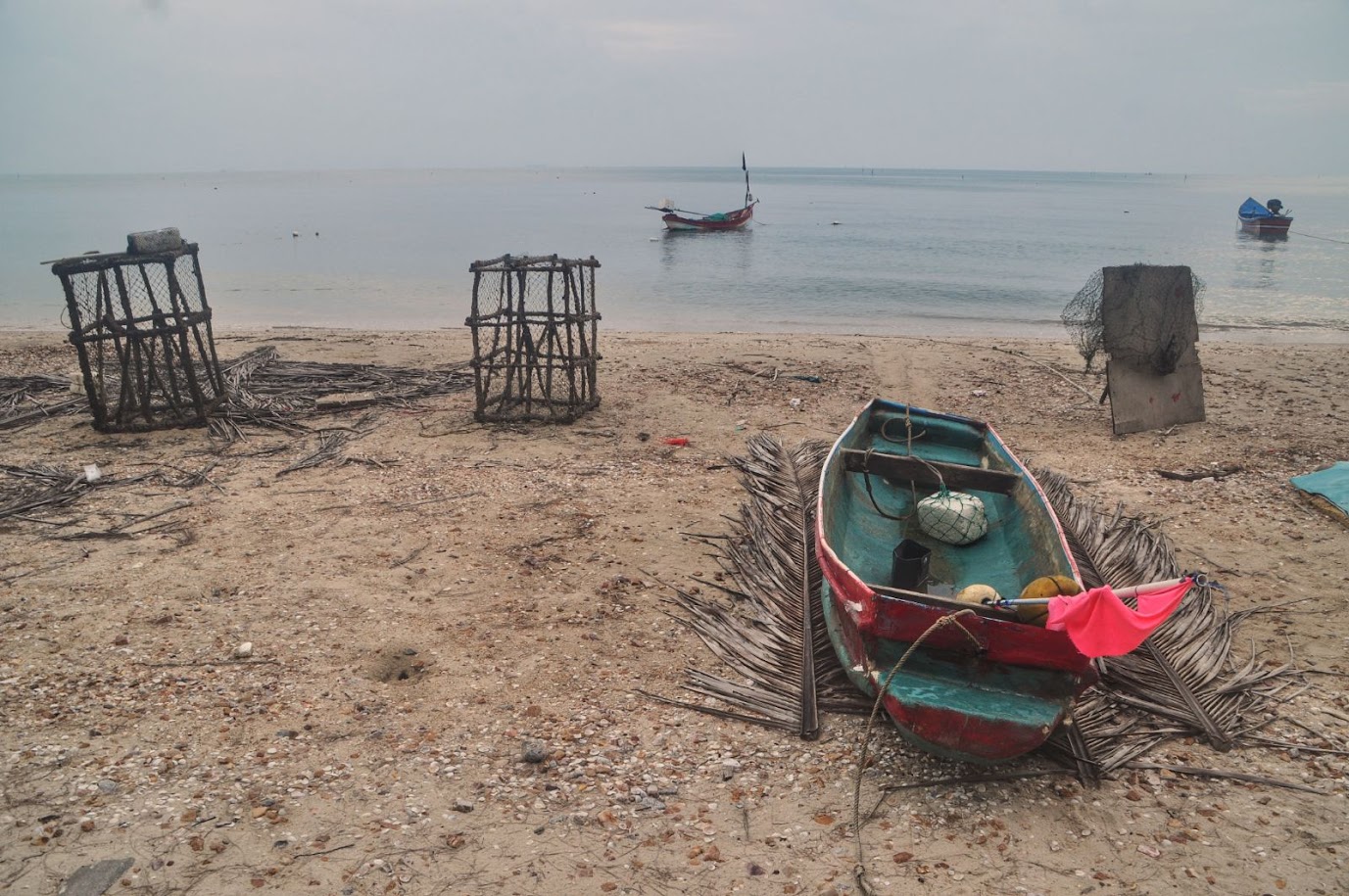 Singhanakorn Beach 
Songkhla Province
Thailand
Fishermen boats
Fishing cages