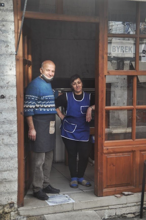 Friendly owners poses for a picture infront of Byrek in Gjirokaster Bazaar Old Town, Gjirokaster, Albania