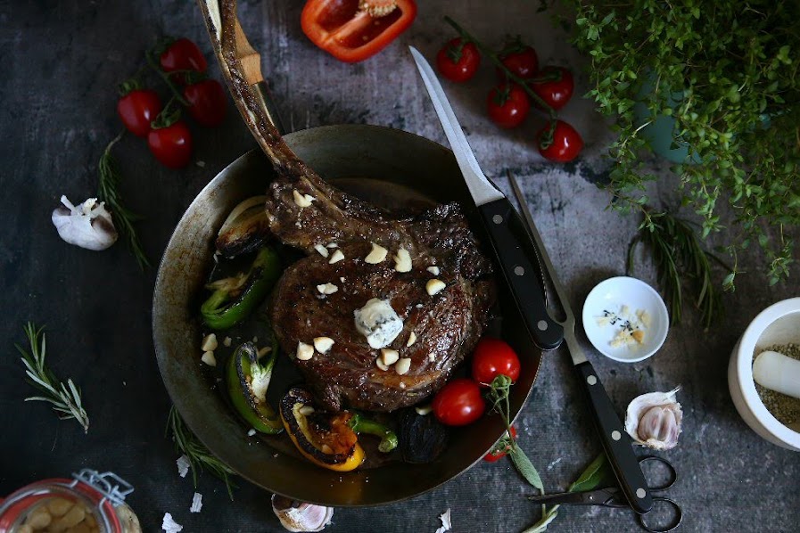 Reverse Seared Tomahawk Steak with Blue Cheese Butter and Macadamia