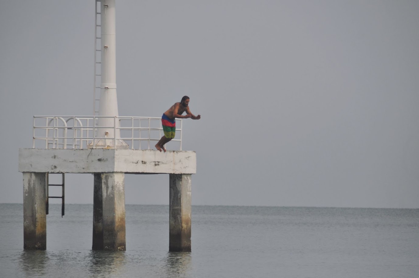 Laem Pho
Pattani Province
Thailand
Lighthouse tower
Man jumping into sea