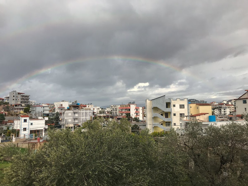 A short-lived rainbow over Ksamil city south albania