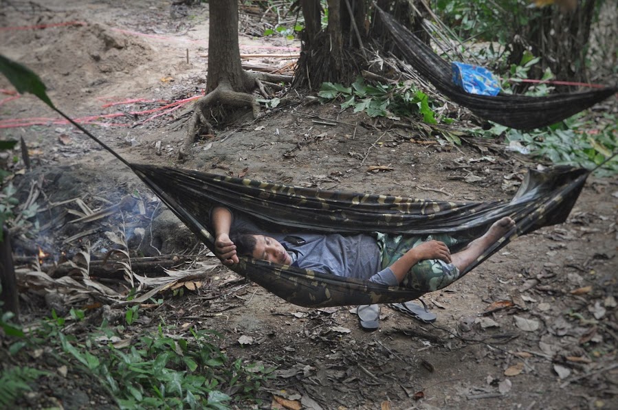 thai worker having a siesta in a hammock