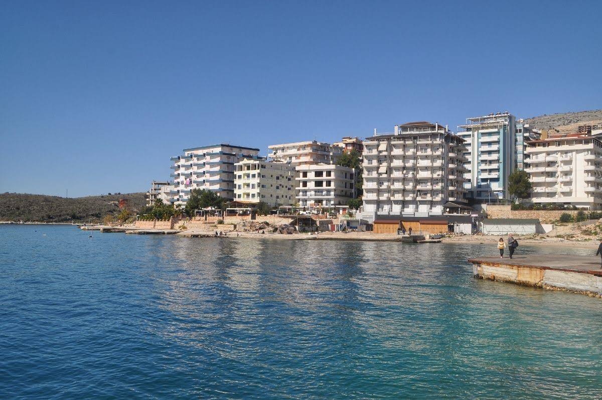 Tall buildings along the shore in saranda, vlora, county, albania
