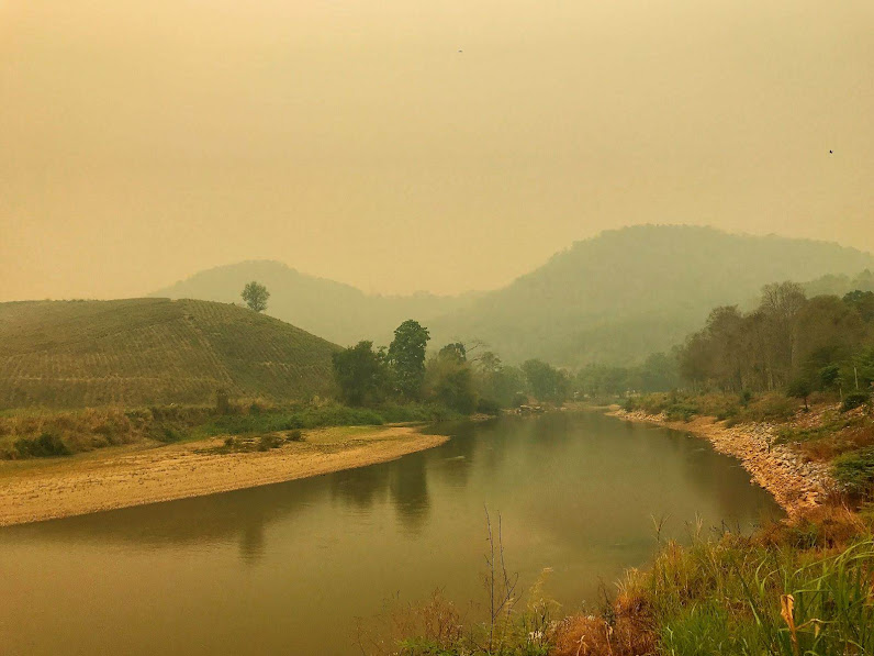 Mae Kok river flowing into the wilderness chiang rai thailand