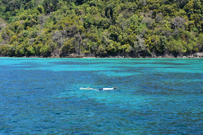 Snorkel in the channel between the 2 sister islands