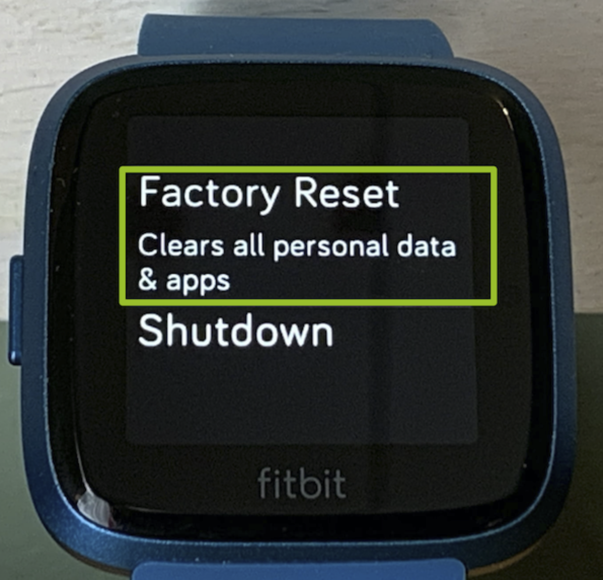 Factory reset Fitbit device.