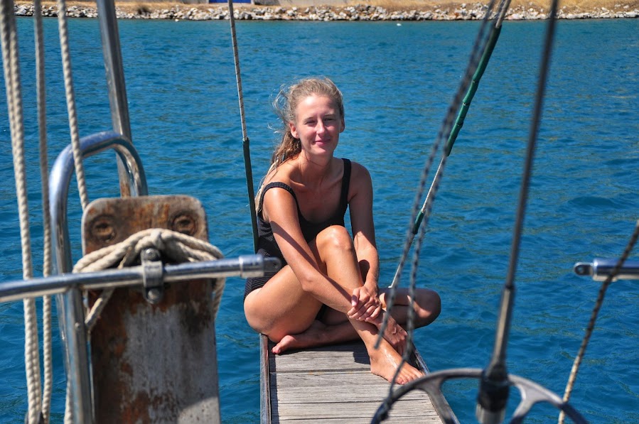 sunbathing on sailboat greece