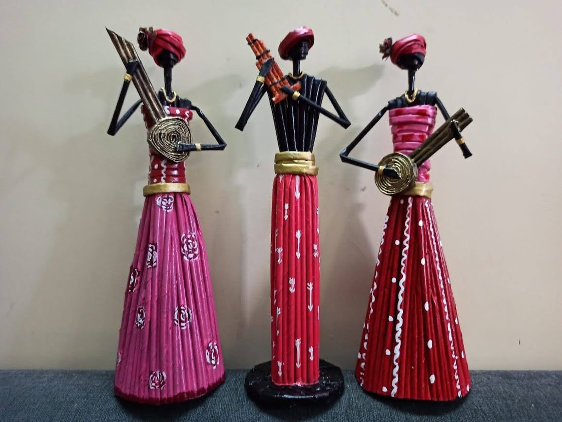 African Paper Doll Playing Musical Instrument