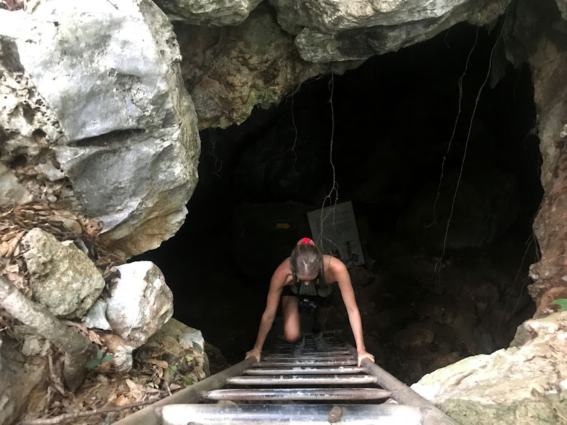 climbing out from Inside Kaew Cave sam roi yot thailand