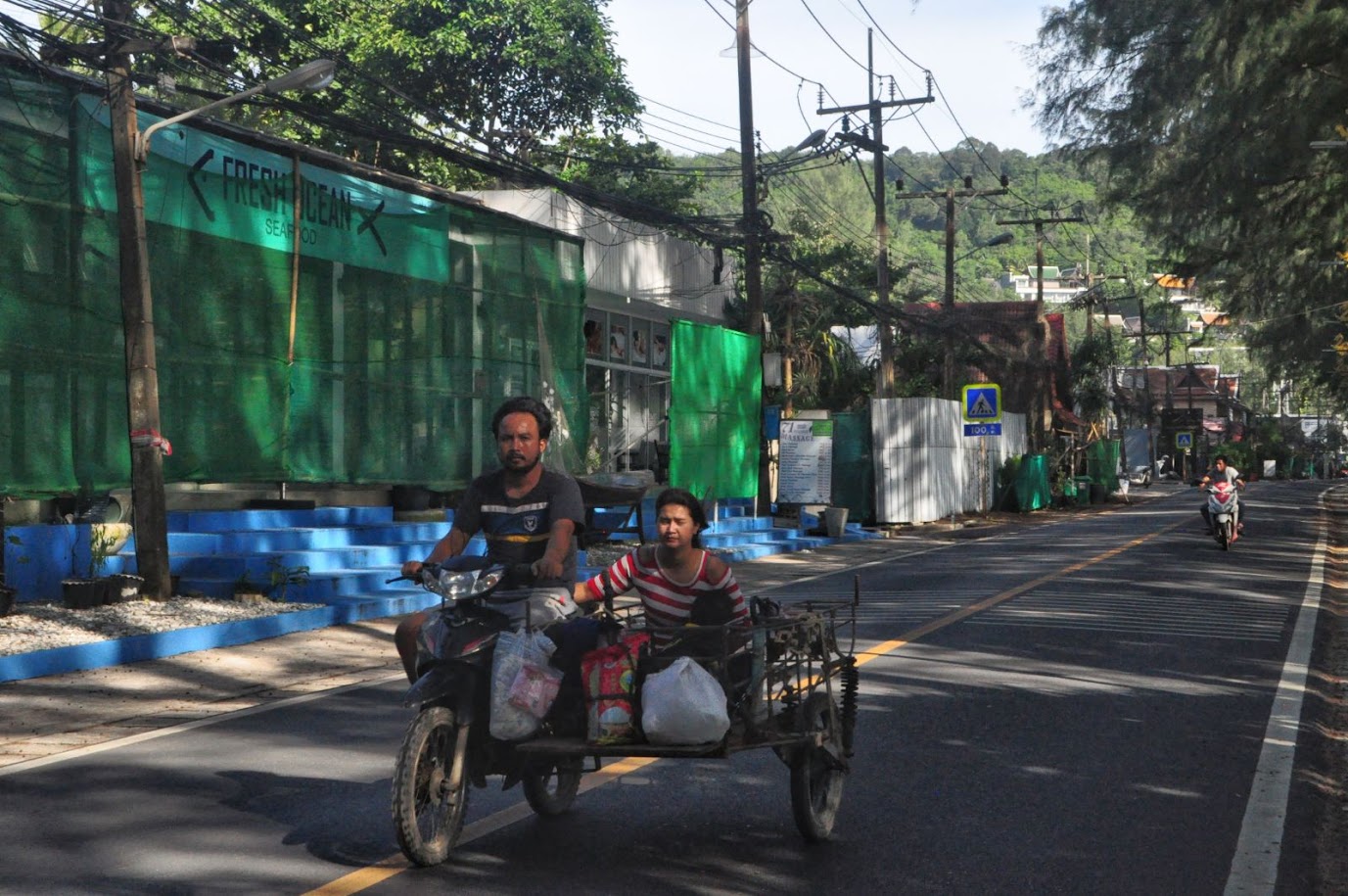 Nai Thon Beach
Phuket Island
Thailand
Thai people on cart