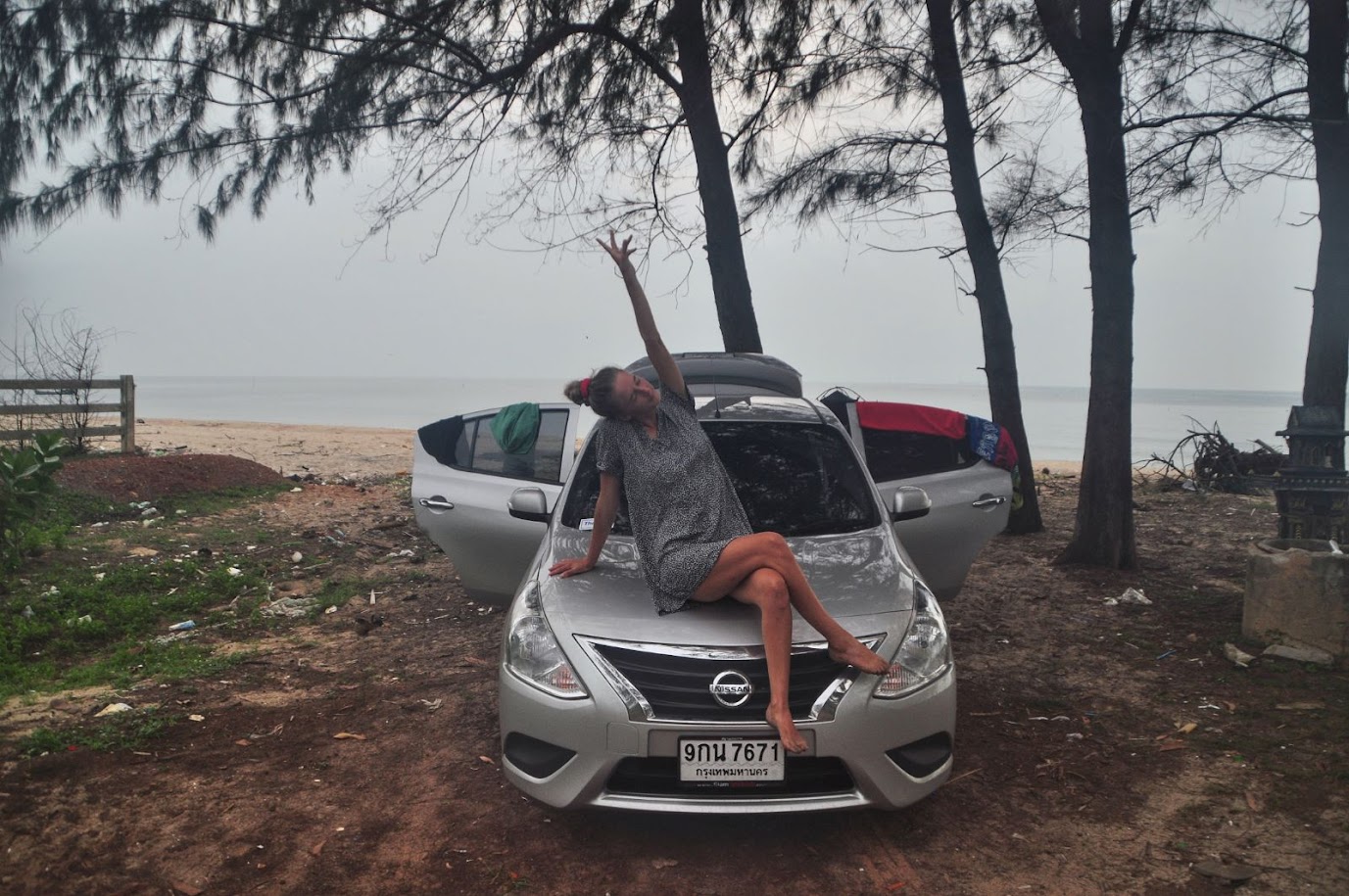 Singhanakorn Beach 
Songkhla Province
Thailand
Nissan car
Girl posing