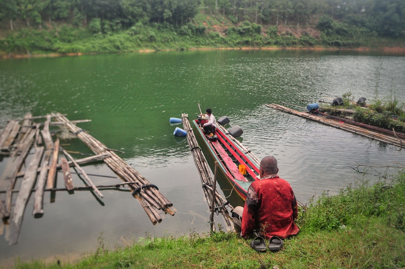 Bang Lang Reservoir
Yala Province
Thailand
Dad and son in long narrow boat