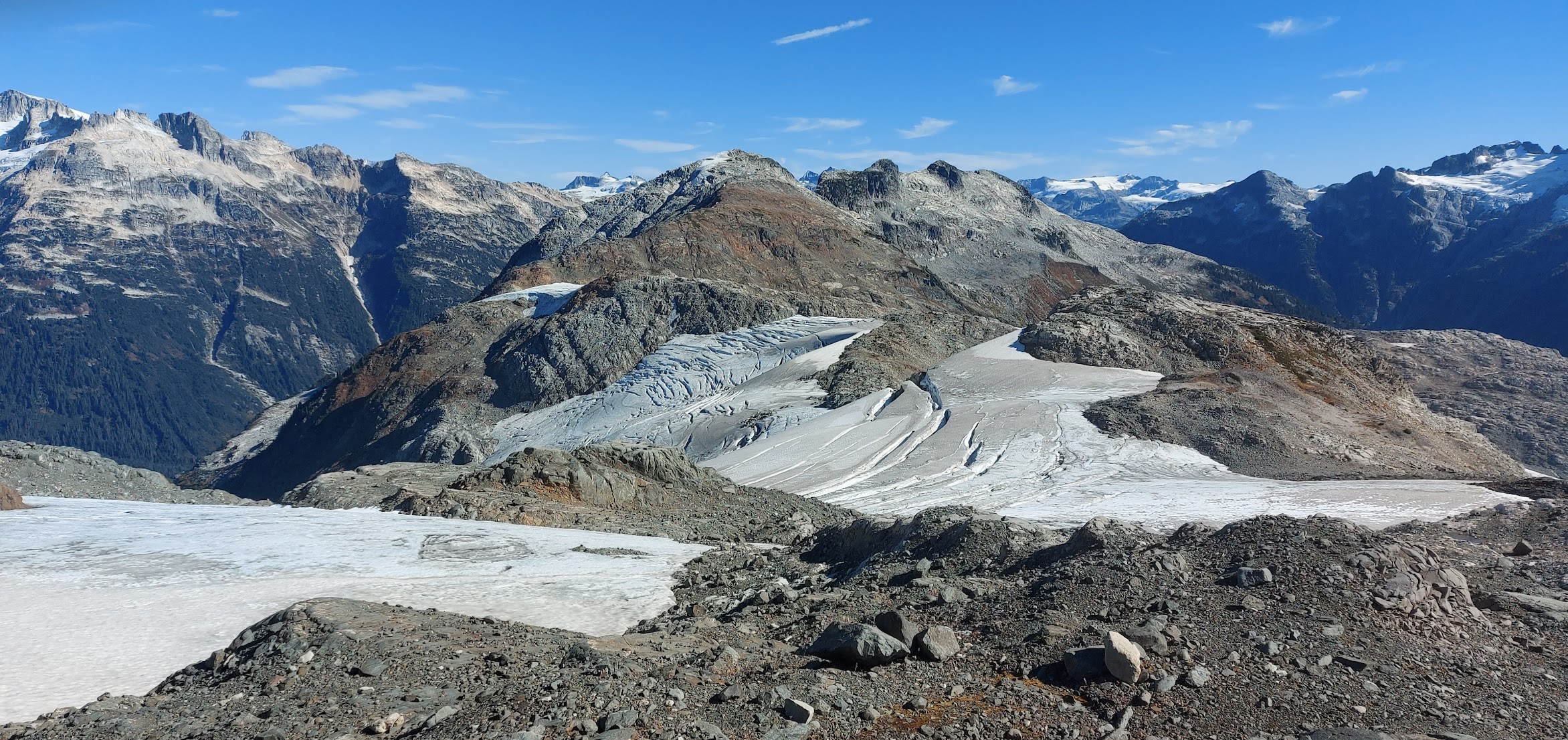 Alternating rock and glacier with deep valley to the left