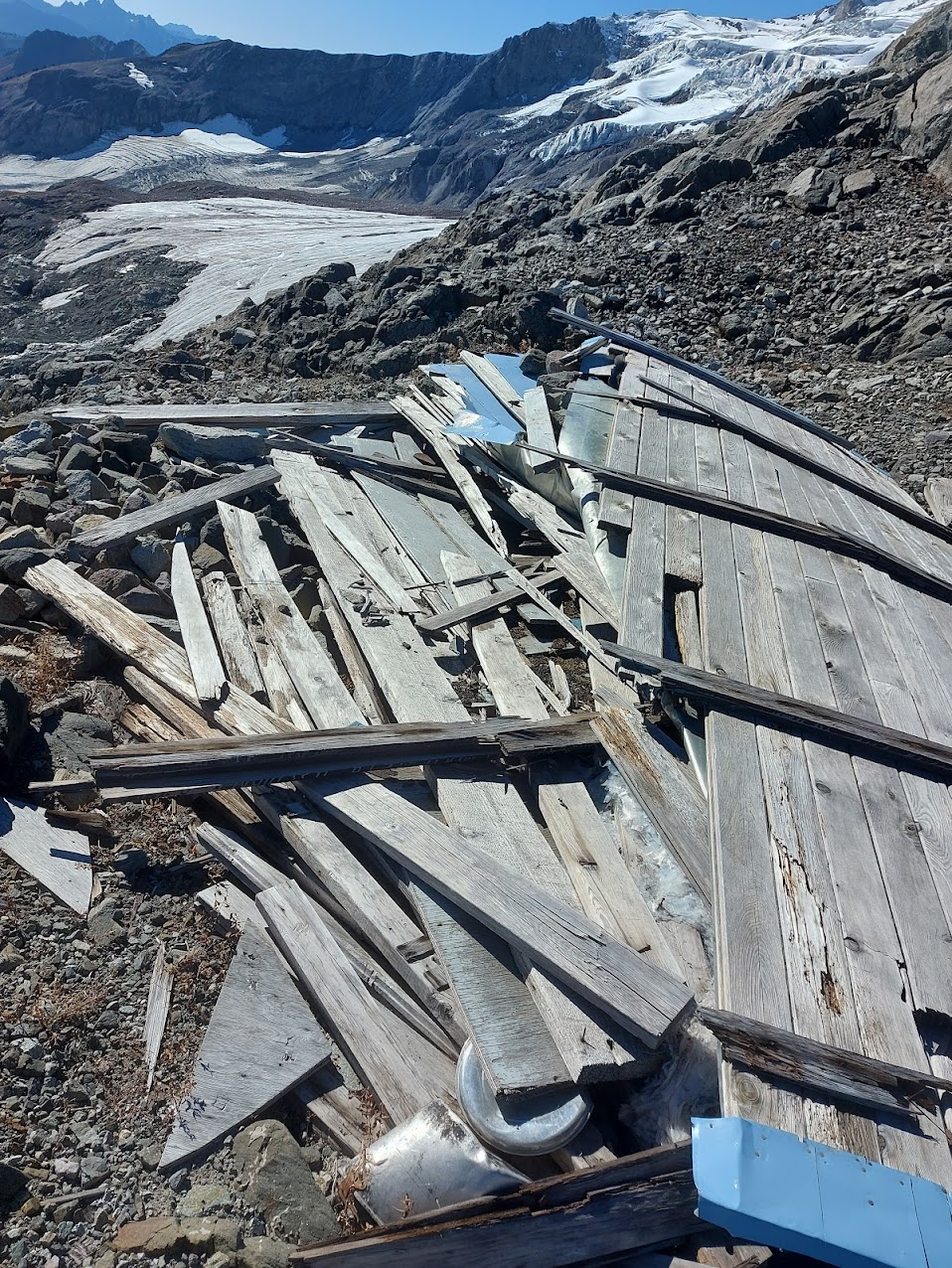 completely flattened alpine hut