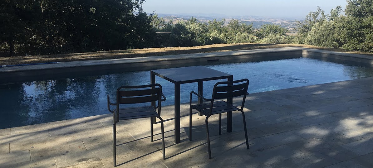 Early morning light at the private swimming pool at Podere Santa Pia