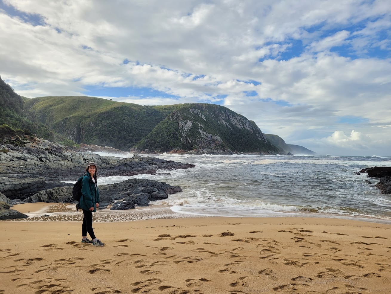 Hiking through the stunning ocean scenery of Tsitsikamma National Park on South Africa’s Garden Route.