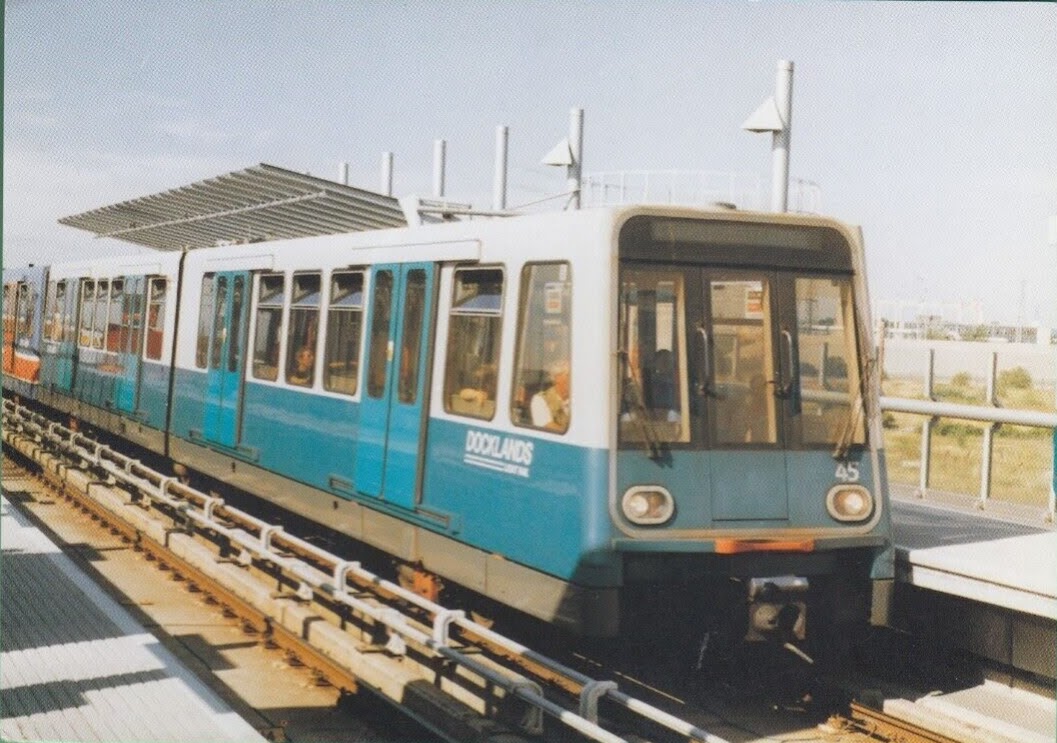 DLR B92 train in turquoise livery