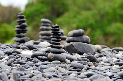 Hin Ngam Beach has black rocks of different shapes with beautiful patterns