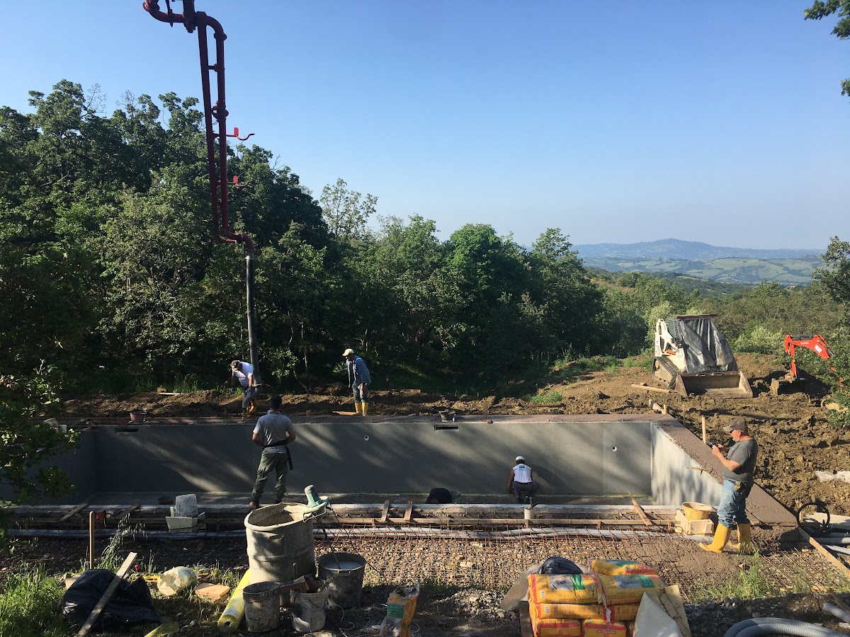 Construction of the Santa Pia swimming pool during the rainy weeks of May