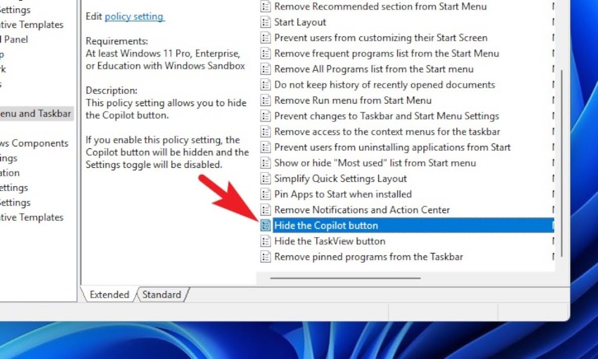 In this section, locate and double-click on the 'Hide the Copilot' policy to access its properties.
