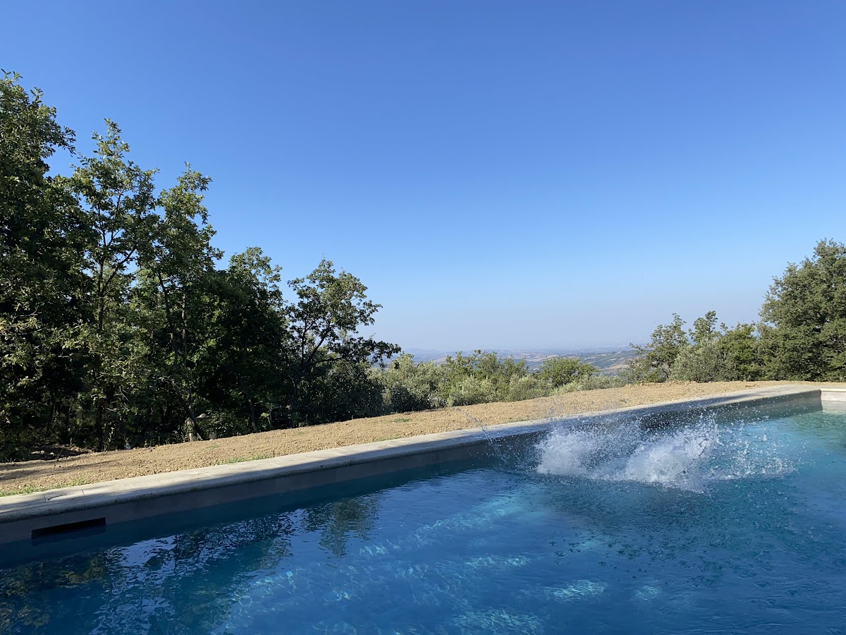 A bigger splash in Podere Santa Pia's swimming pool, southern Tuscany