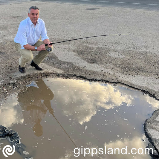 A King-sized pothole? Darren Chester says funding to improve safety on the Princes Highway is in limbo because of delays in the review process initiated by Minister for Infrastructure and Transport Catherine King