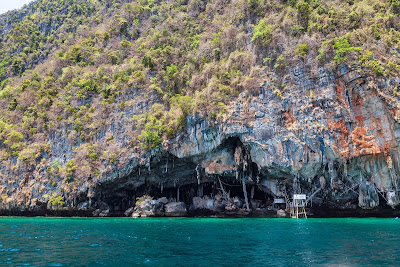 Slowly cruise past Viking Cave