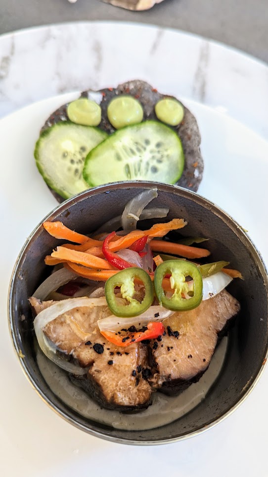 Oregon Albacore Tuna -  as prepared by Chef Maylin Chavez, a canned albacore tuna tostada, using miso, tahini, escabeche, cucumber, and avocado mousse