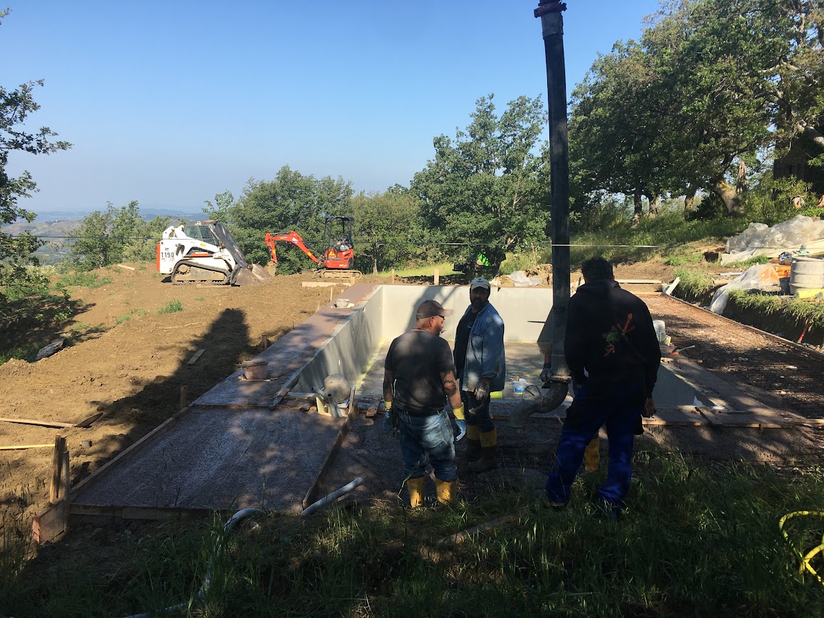 Construction of the Santa Pia swimming pool during the rainy weeks of May