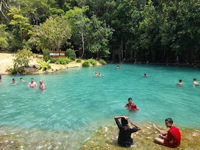 Swim in blue-green and clear water of the Emerald Lagoon