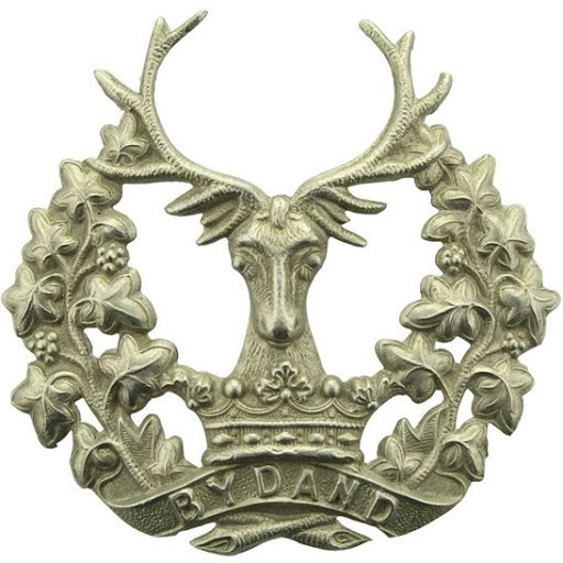 Peter Downie cap badge