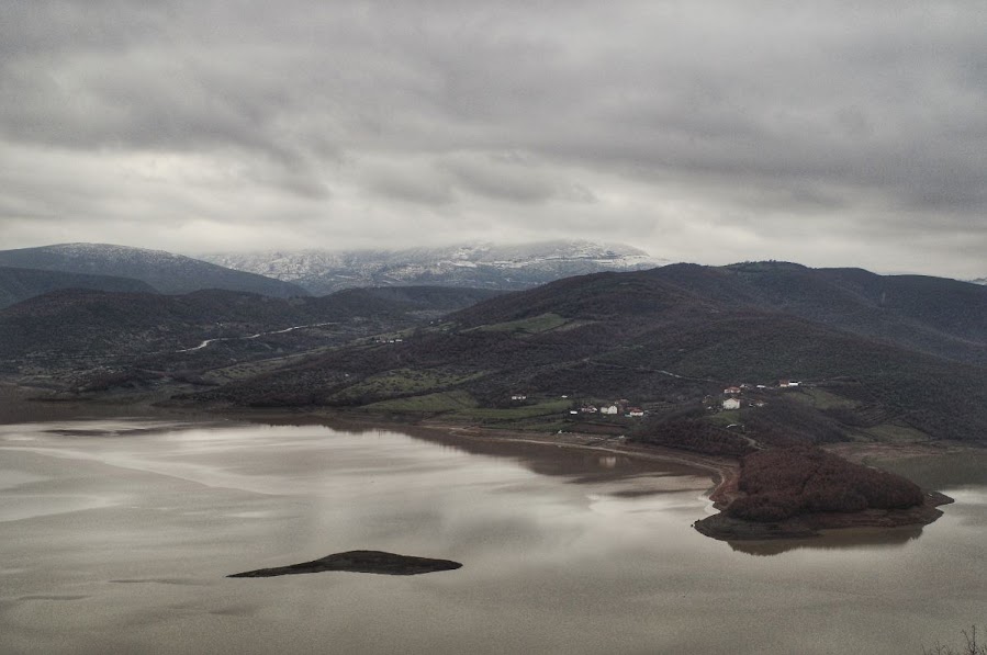 Snowy mountains and a lake in Kukes, Albania