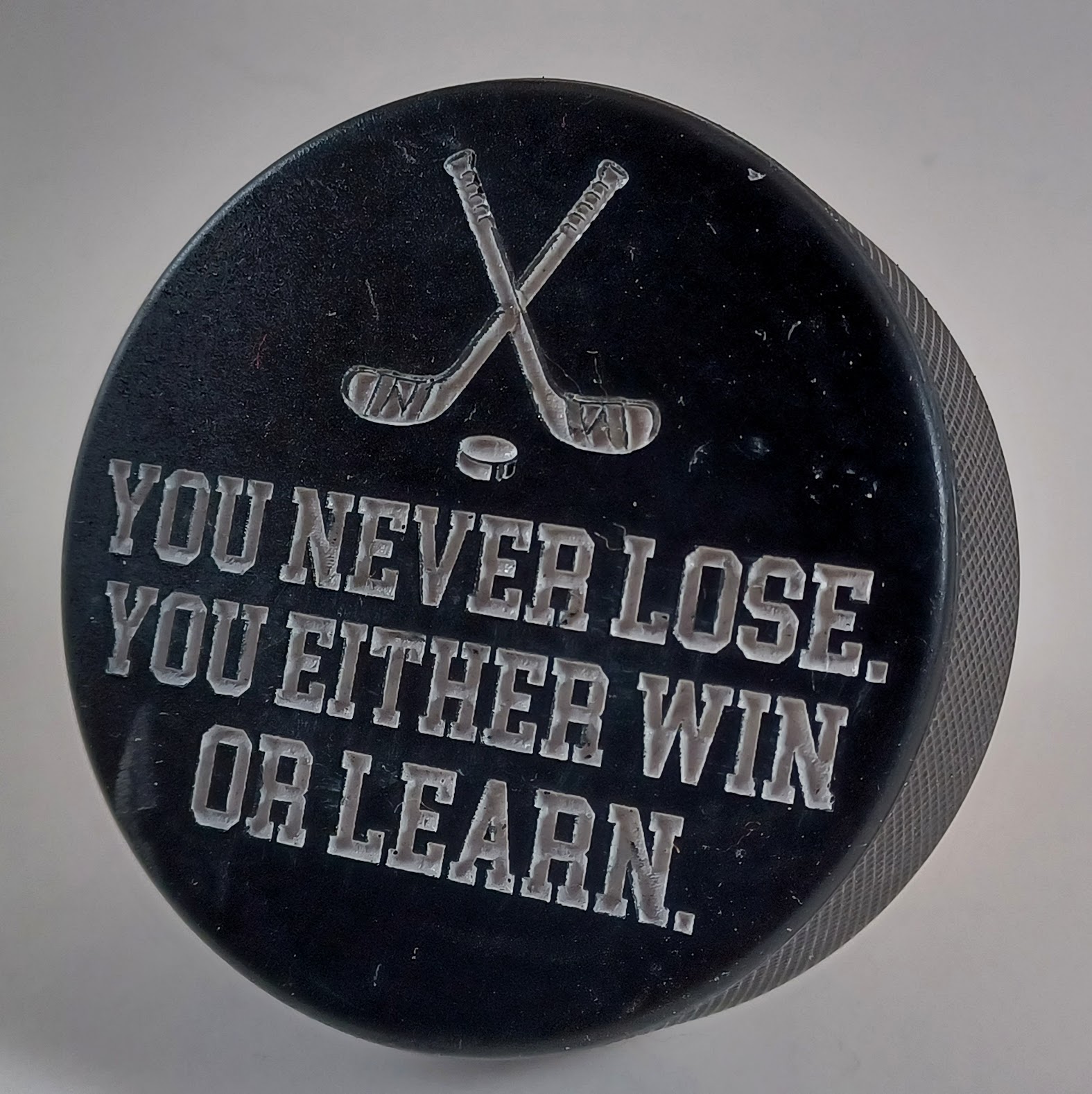 Win or Learn Puck