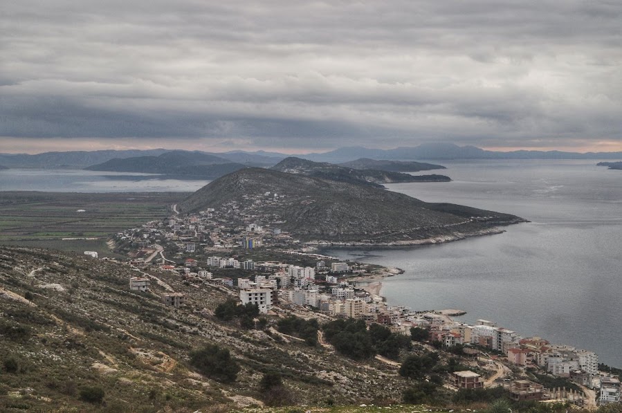 An aerial view of the city Saranda, Vlora County, Albania in the winter. The Ionian Sea and Corfu are in the distance
