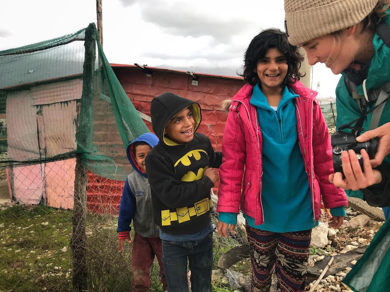 A group of happy gypsy children pose for a picture in the gypsy quarters in Gjirokaster,
Albania