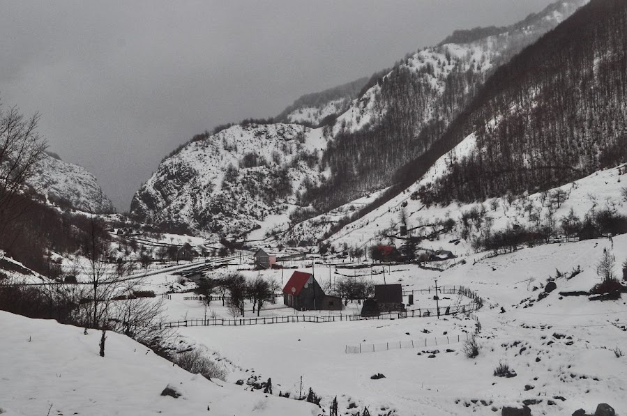 Houses in the snow in Vermosh Valley, Shkoder County, Albania in the winter.
