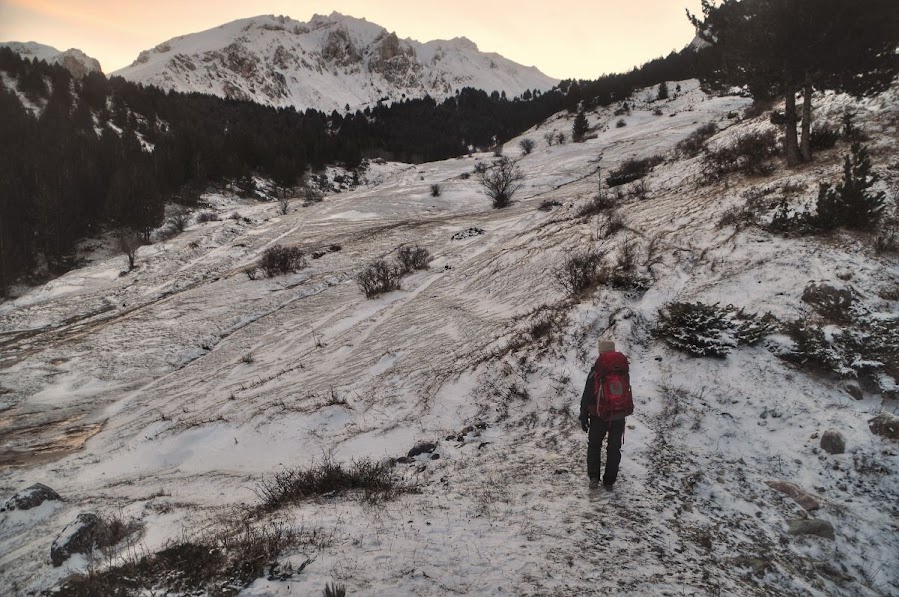 A girl trekking snowy Mount Korab, Diber County, Albania in the winter.