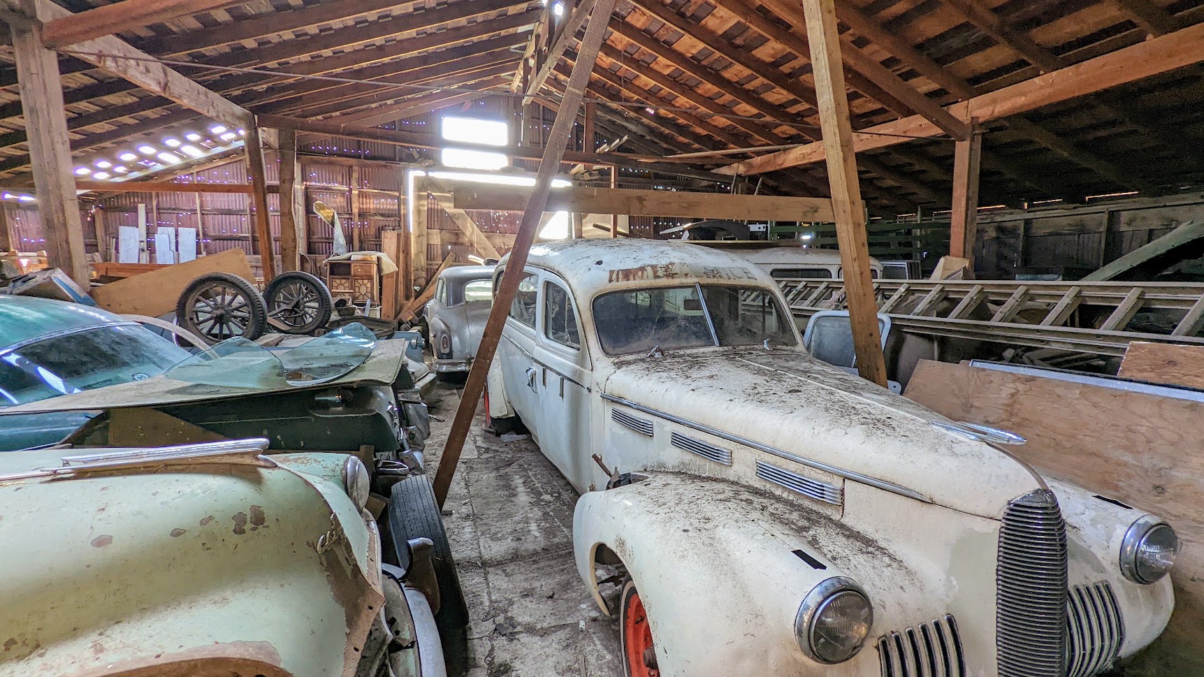 Planning a Trip to the Painted Hills - we opted to take 97 as part of the Journey Through Time Scenic Byway from Portland through Shaniko where we saw this across the street the Wagon Yard - the Shaniko Livery Barn, free to visit/requested donation box viewing of vehicles from the past